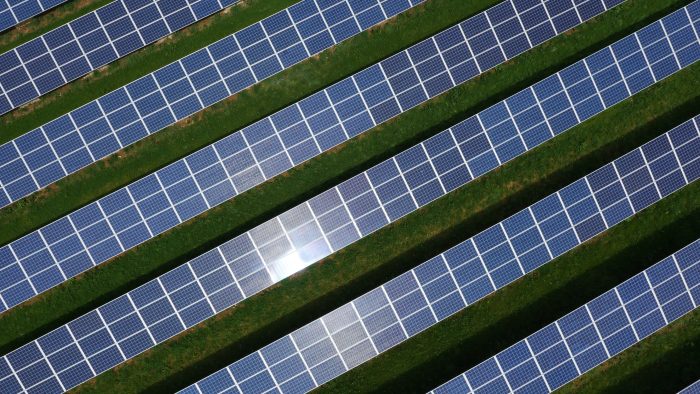 Close-up of several rows of solar panels