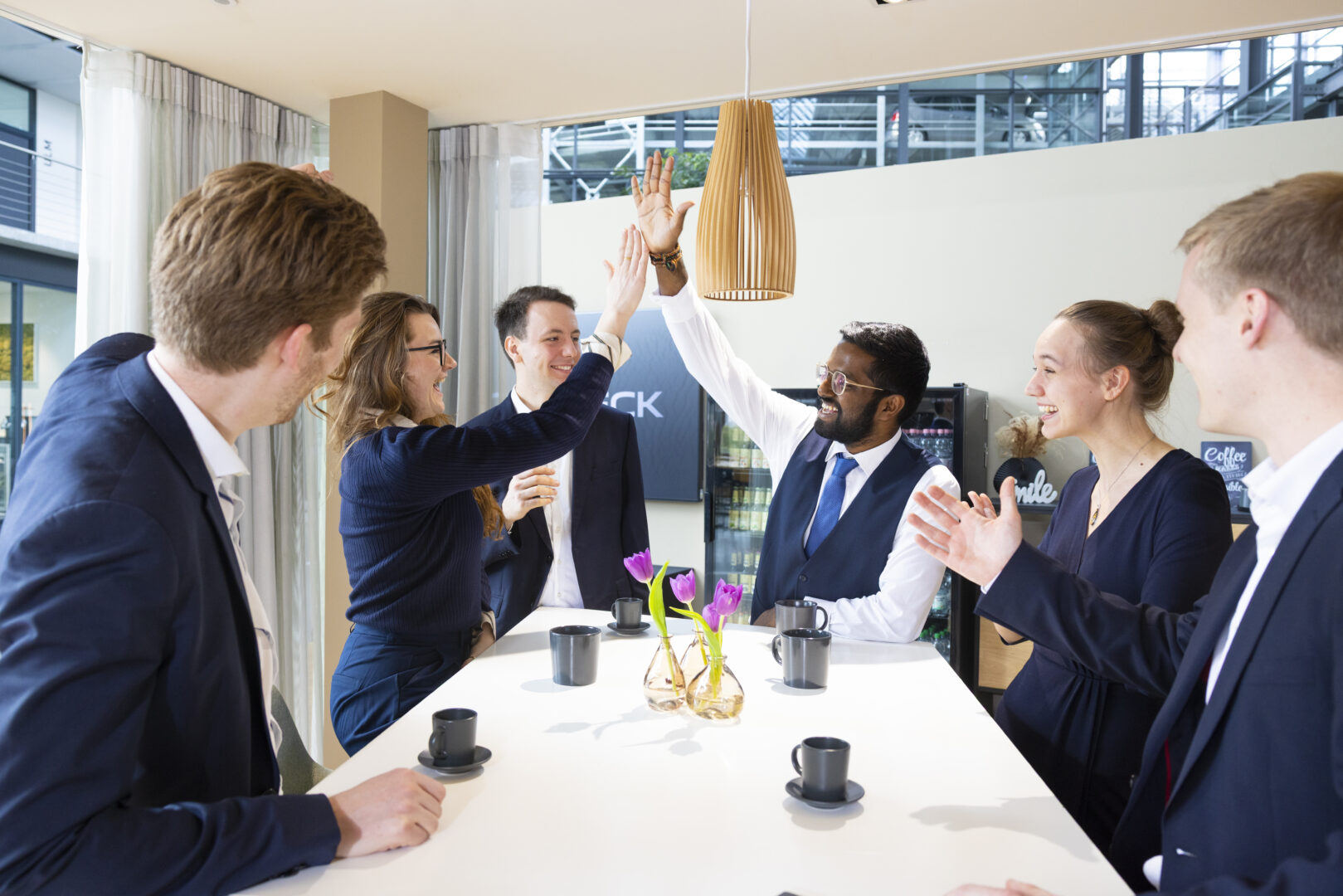Two People giving High Five to each other